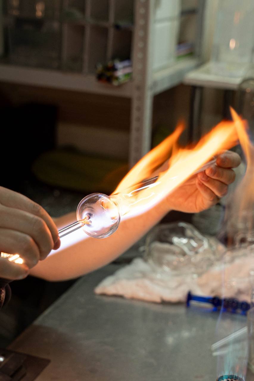 Glass part in a torch flame
